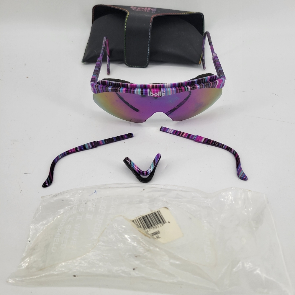 Bolle Edge II Sunglasses.  Comes with Case,  Extra Ear Wires, and Clear Glass